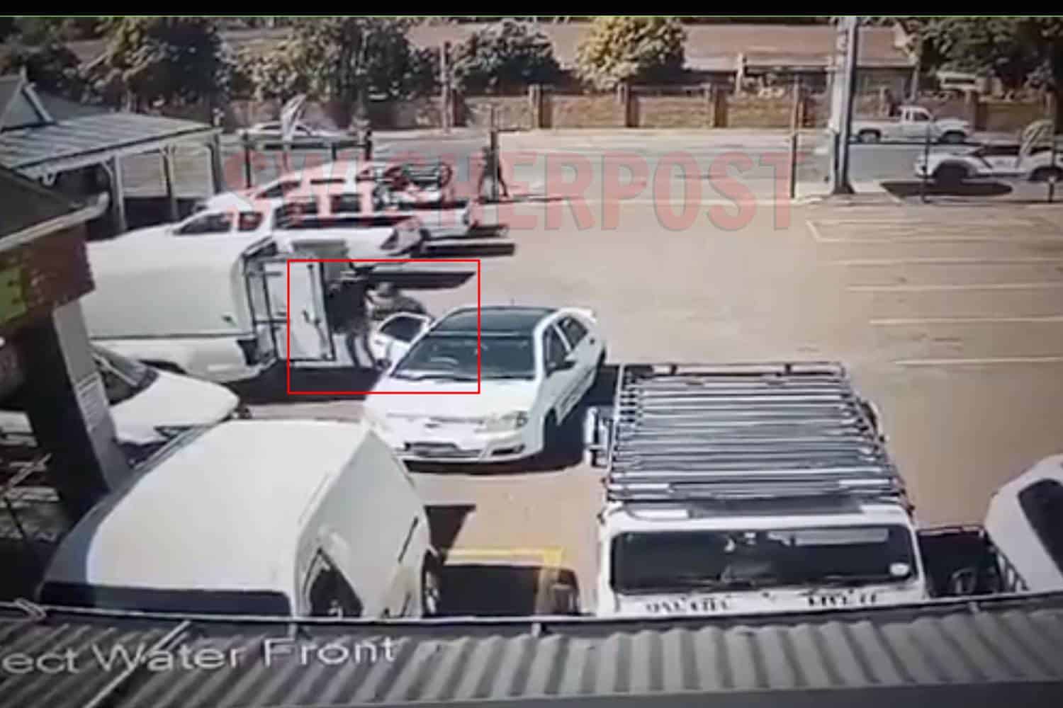 footage of a man accosted at a parking lot