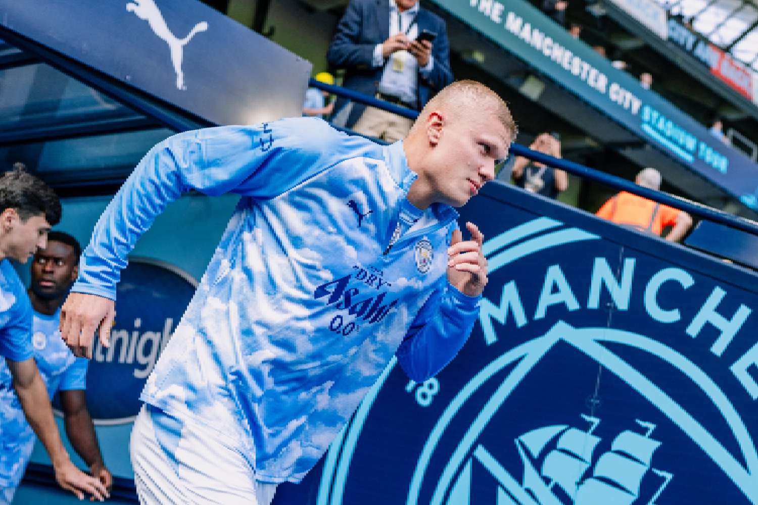erling haaland new hairstyle man city