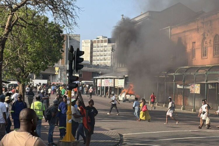 durban unrest vehicles torched home affairs protest